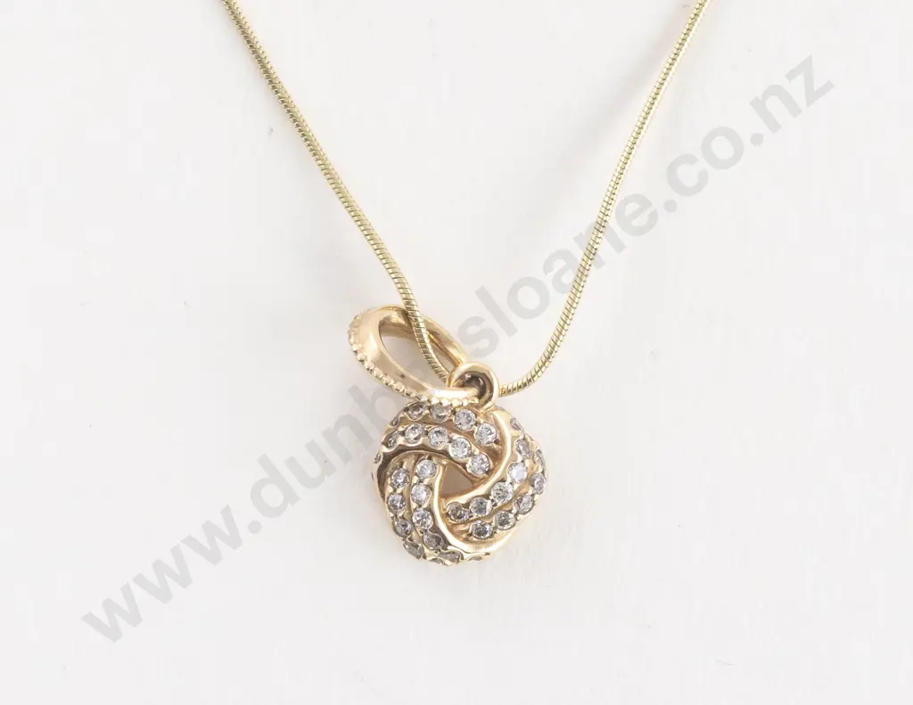 9ct 37Sone Cubic Zirconia Love Knot Pendant on 10ct Neck Chain Image 1++