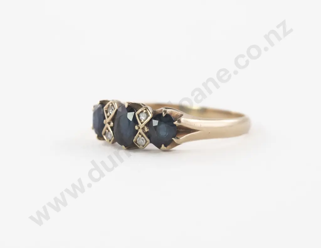 9ct Seven Stone Sapphire and Diamond Bridge Ring Image 1++