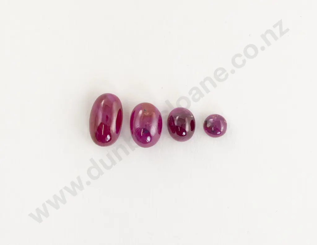 Four Unmounted Star Rubies Image 1++