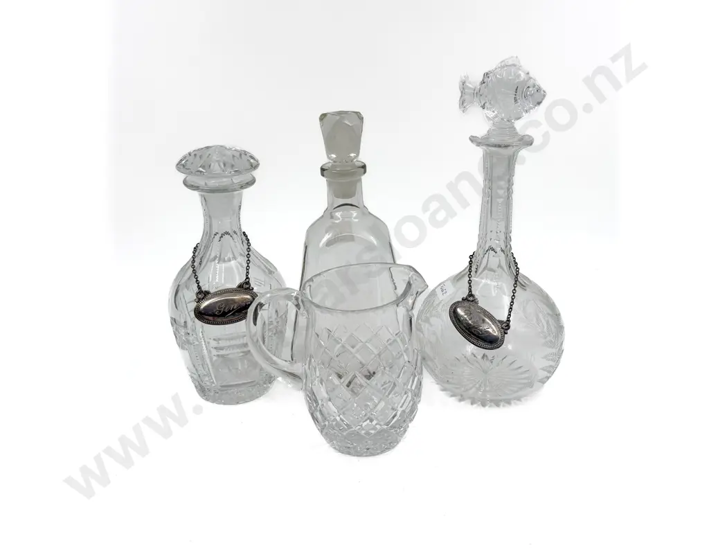 Three Assorted Decanters together with Crystal Jug Image 1++