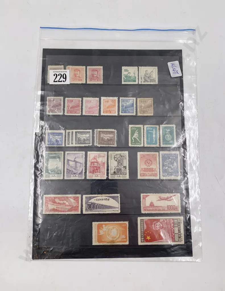 Stock Book Page Chinese & Korean Stamps Image 1++