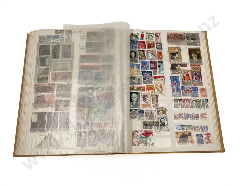 Four Vintage World Stock Book Albums Image 1++