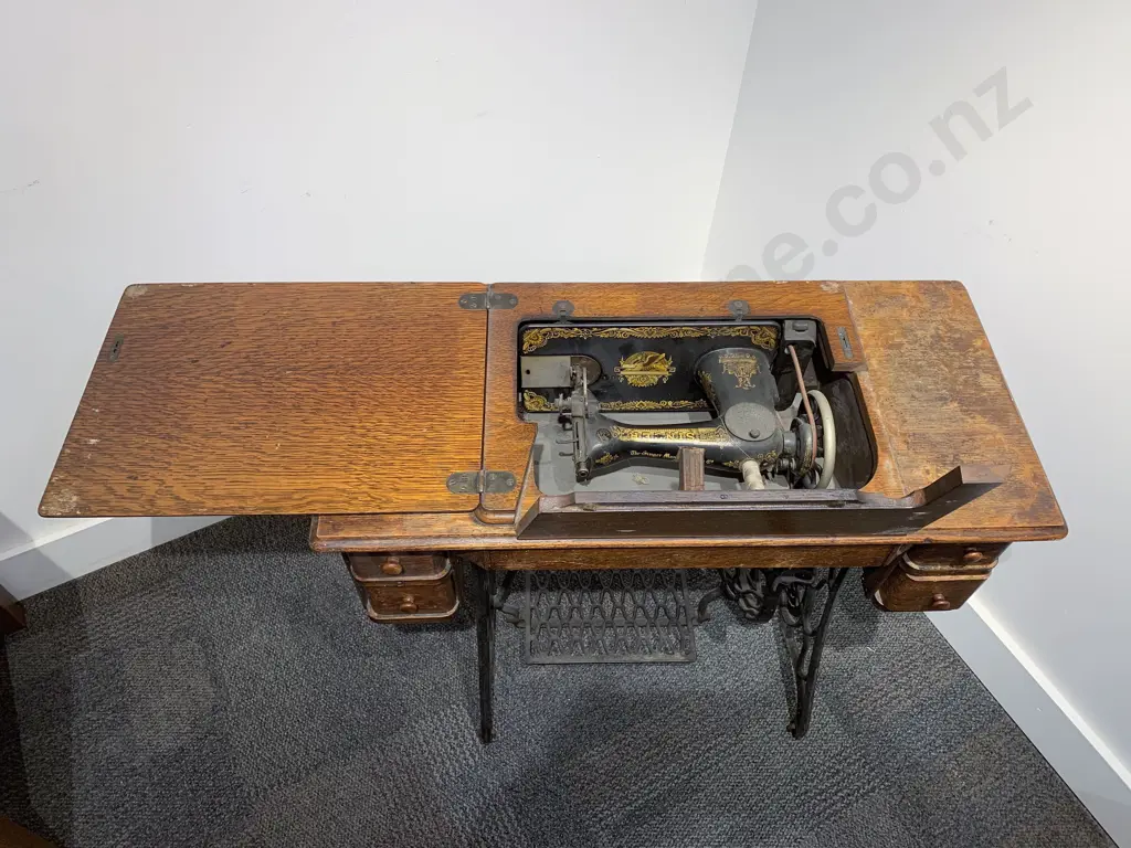 Singer Sewing Machine on Treadle Base Image 1++