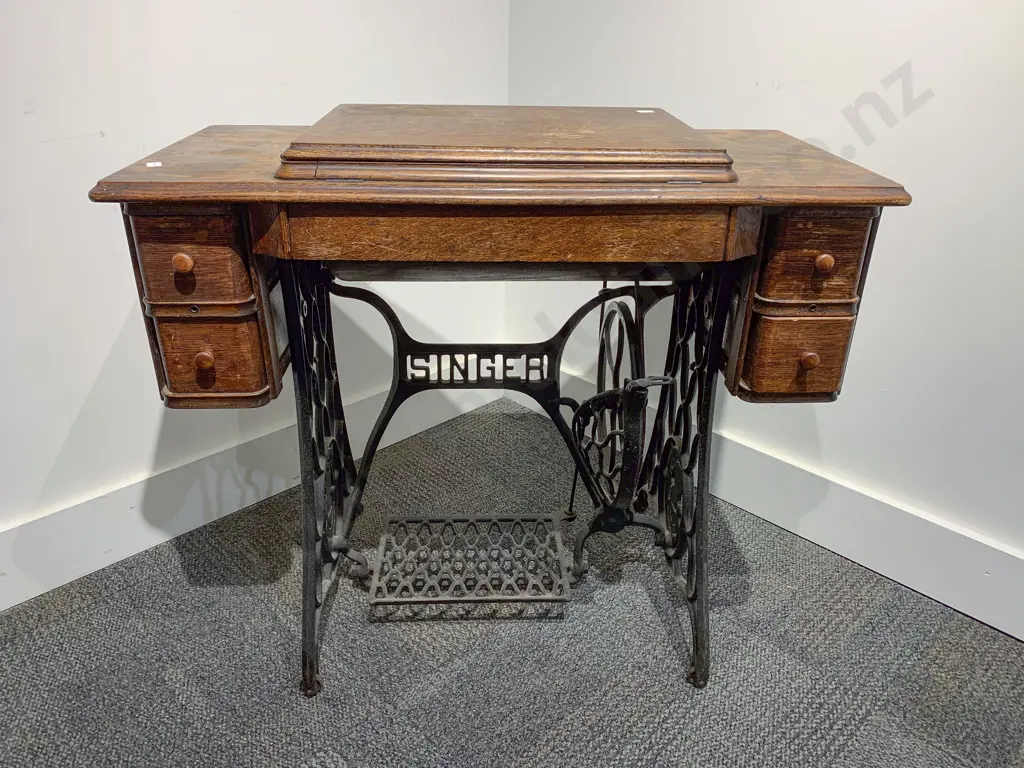 Singer Sewing Machine on Treadle Base Image 1++