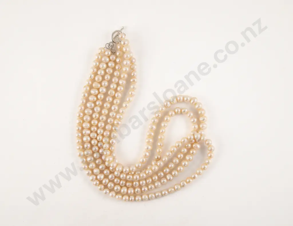 Triple Strand Slightly Graduated Cultural Pearl Necklace Image 1++