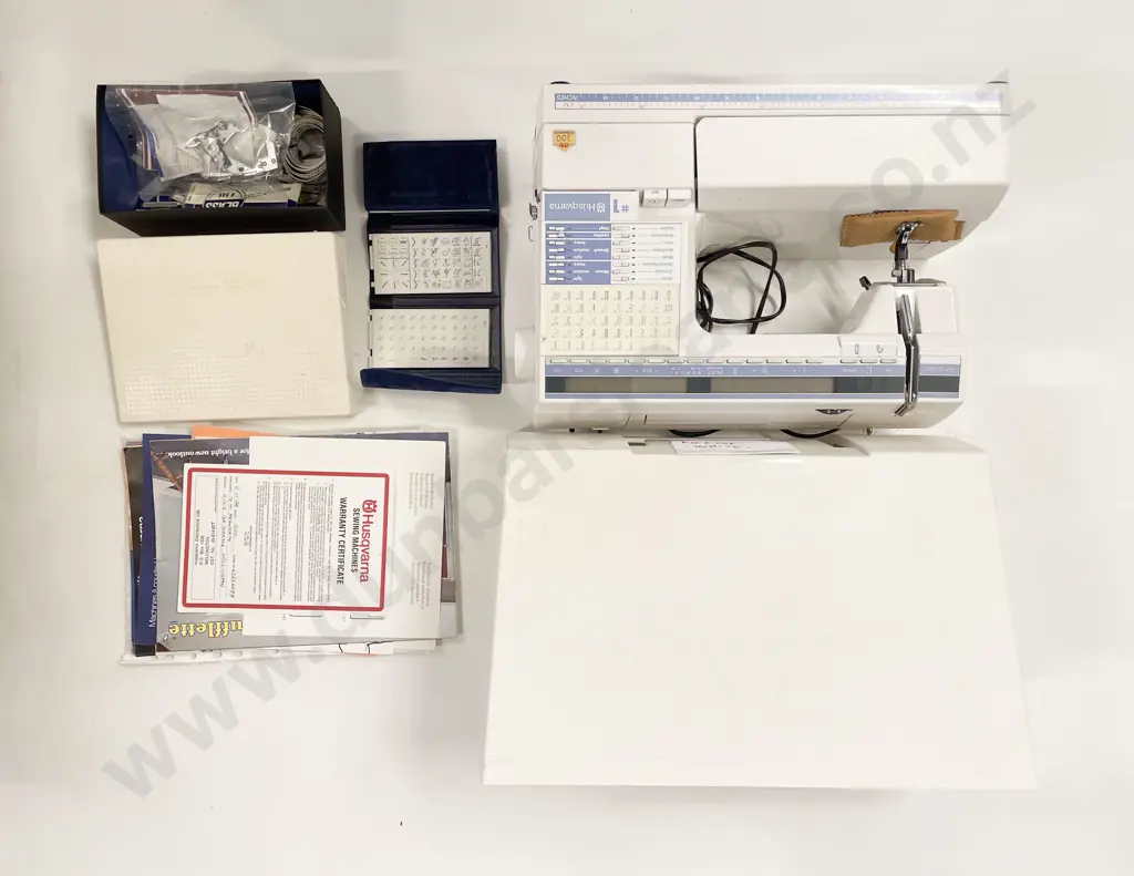 Husqvarna Sewing Machine together with Assorted Accessories Image 1++