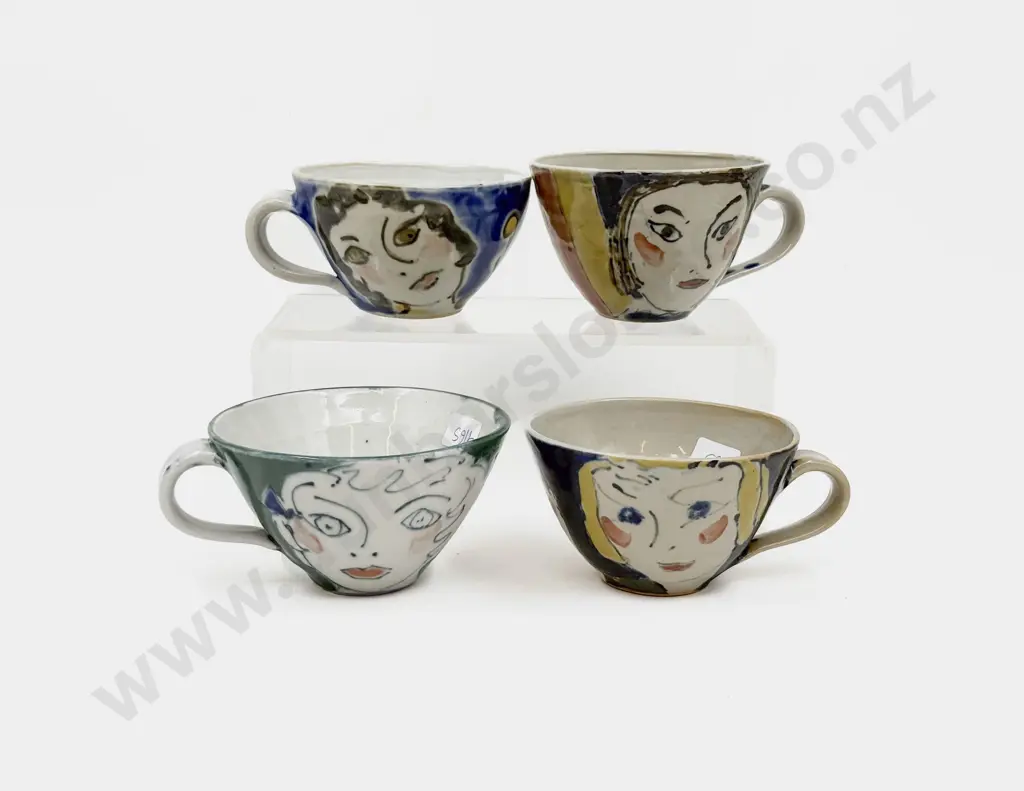 Four Pottery Mugs Image 1++