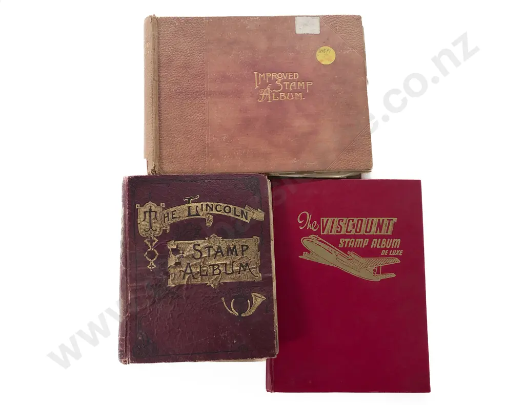 Three Vintage World Stamp Albums Image 1++