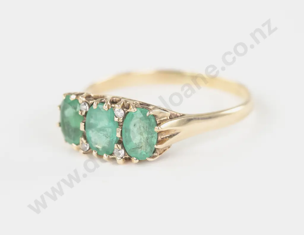 9ct Seven Stone Emerald and Diamond Bridge Ring Image 1++