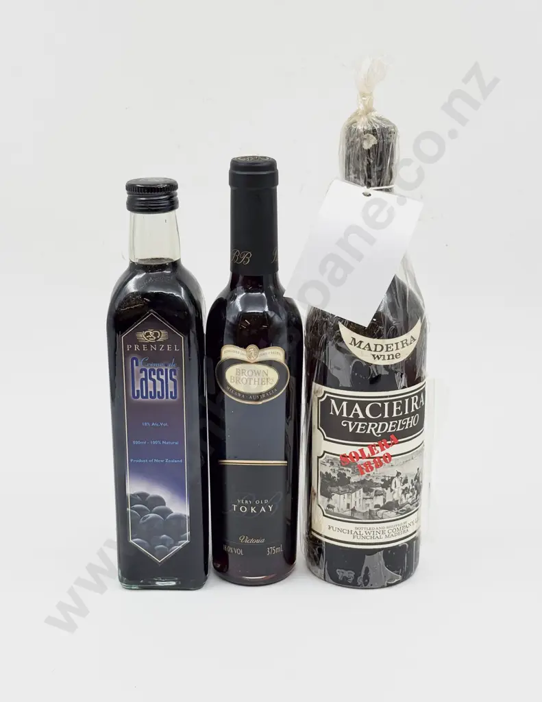 Three Bottles of Assorted Alcohol Image 1++
