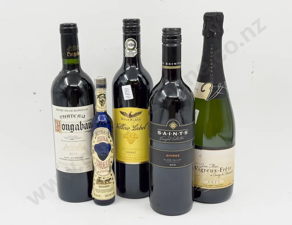 Four Bottles of Assorted Wine together with Small Bottle of Liqueur Image 1++