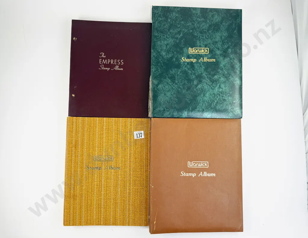 Four World Vintage Stamp Albums three with few stamps Image 1++