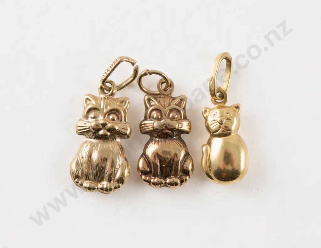 18ct and 9ct Cat Charms Image 1++