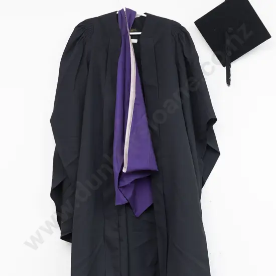 University Graduation Gown with Purple Sash and Cap