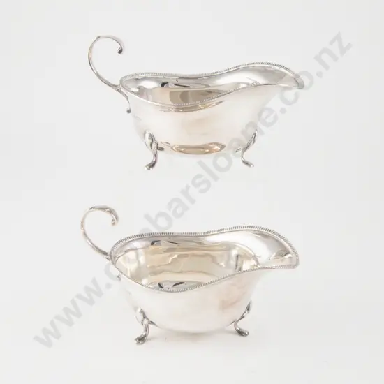 A Pair Of Geo VI S/S Gravy Boats
