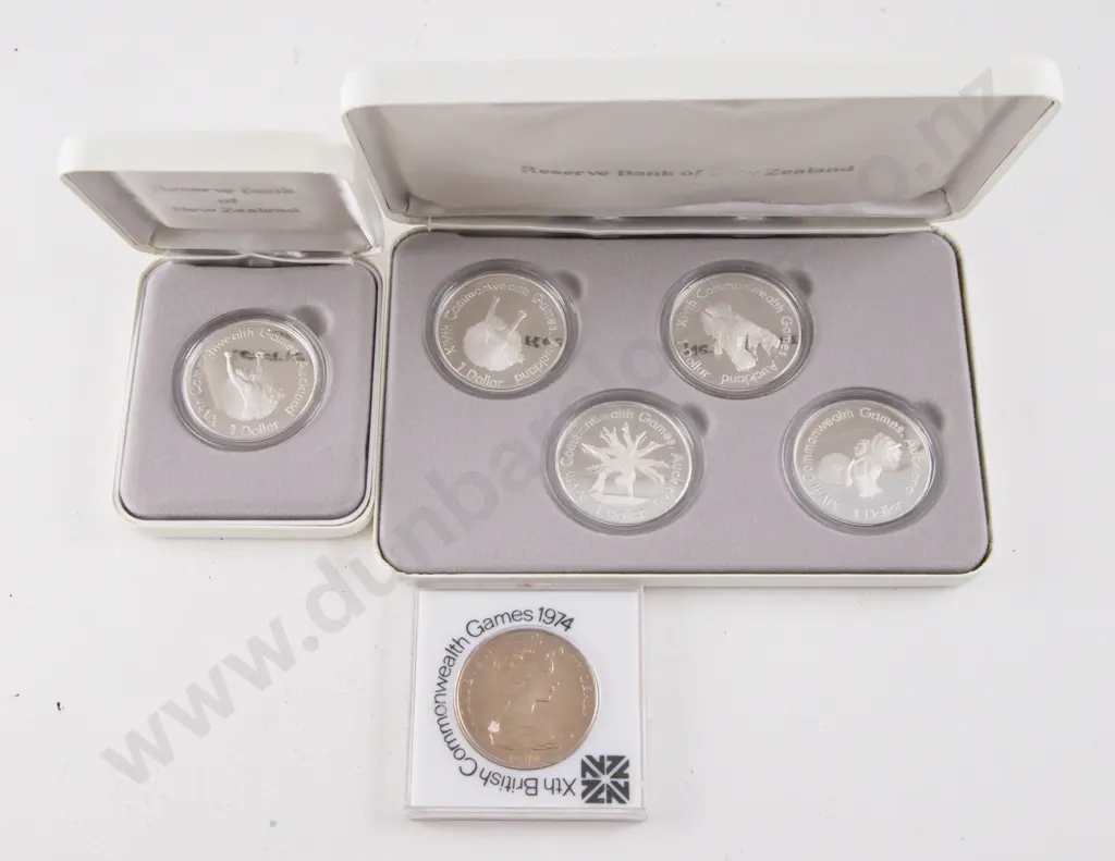 NZ 1990 Proof Silver Dollars Four Coin Series XIVth Commonwealth Games Auckland with Proof and Unc $1 Image 1++