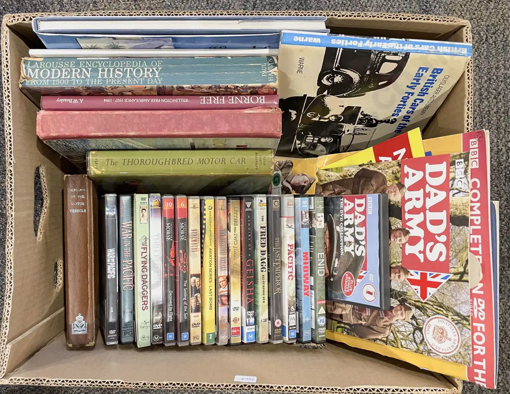 Quantity of Assorted Books & DVDs Image 1++