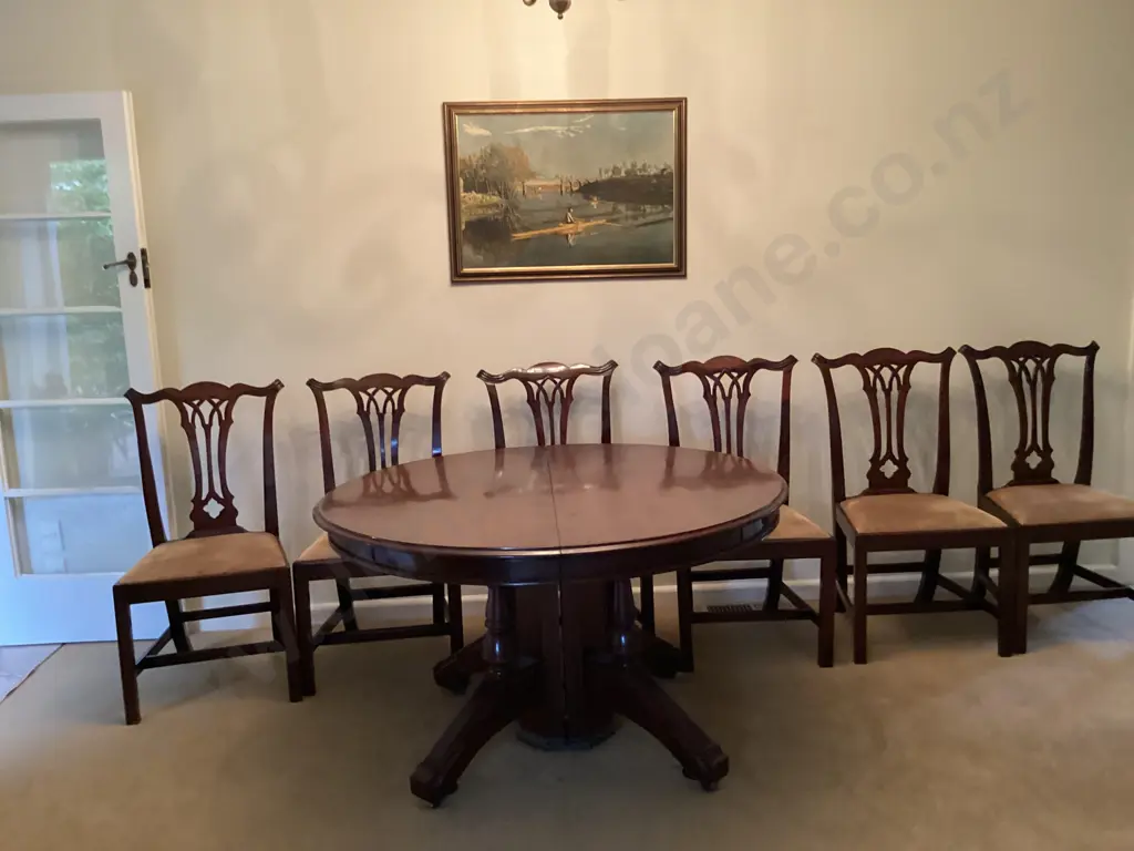 An Attractive Set of Six Geo III Mahogany Dining Chairs with Four Leaf Circular Extension Table Image 1++