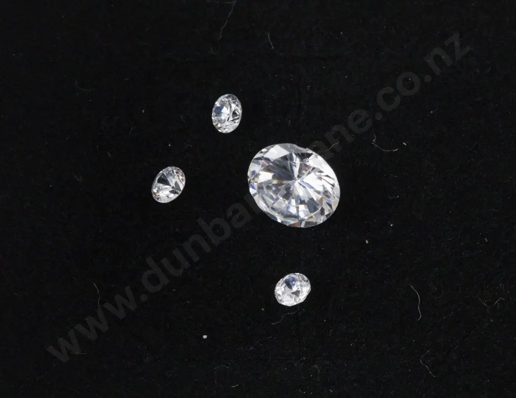 Four Unmounted Imitation Diamonds Image 1++