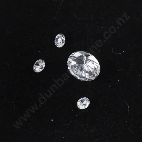 Four Unmounted Imitation Diamonds