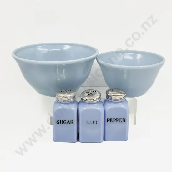 Two Opaque Glass Mixing Bowls with Set of Three Condiment Castors