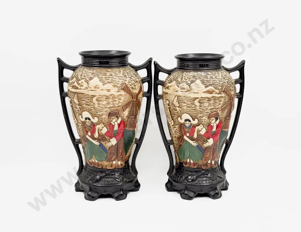 A Pair of Relief Molded Mantle Vases Image 1++