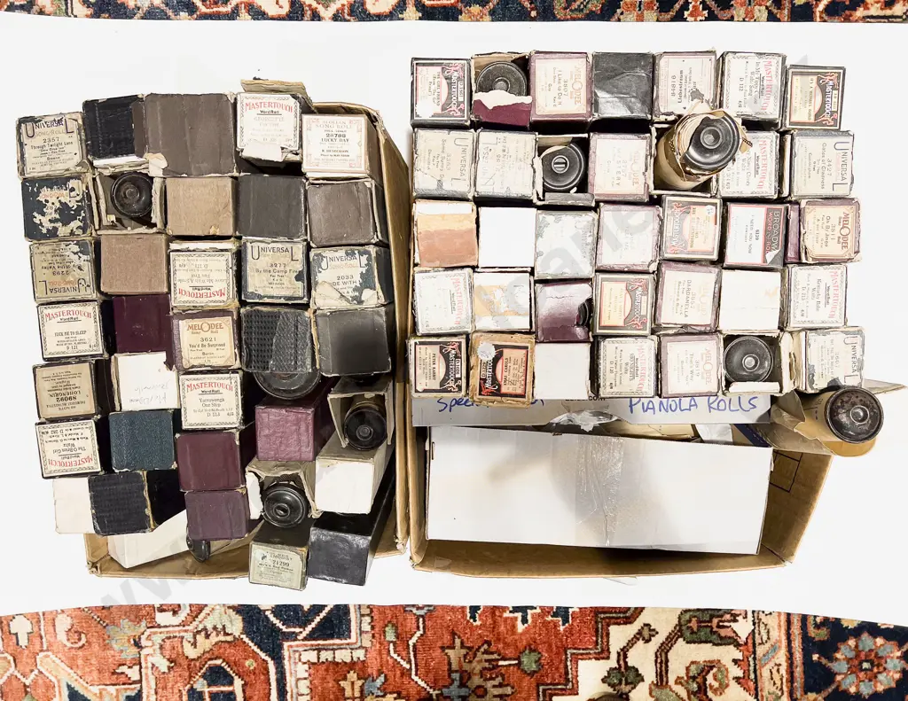 Two Boxes of Assorted Vintage Pianola Rolls Image 1++