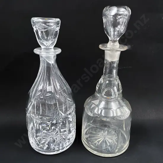 One Crystal Decanter together with One Glass Decanter