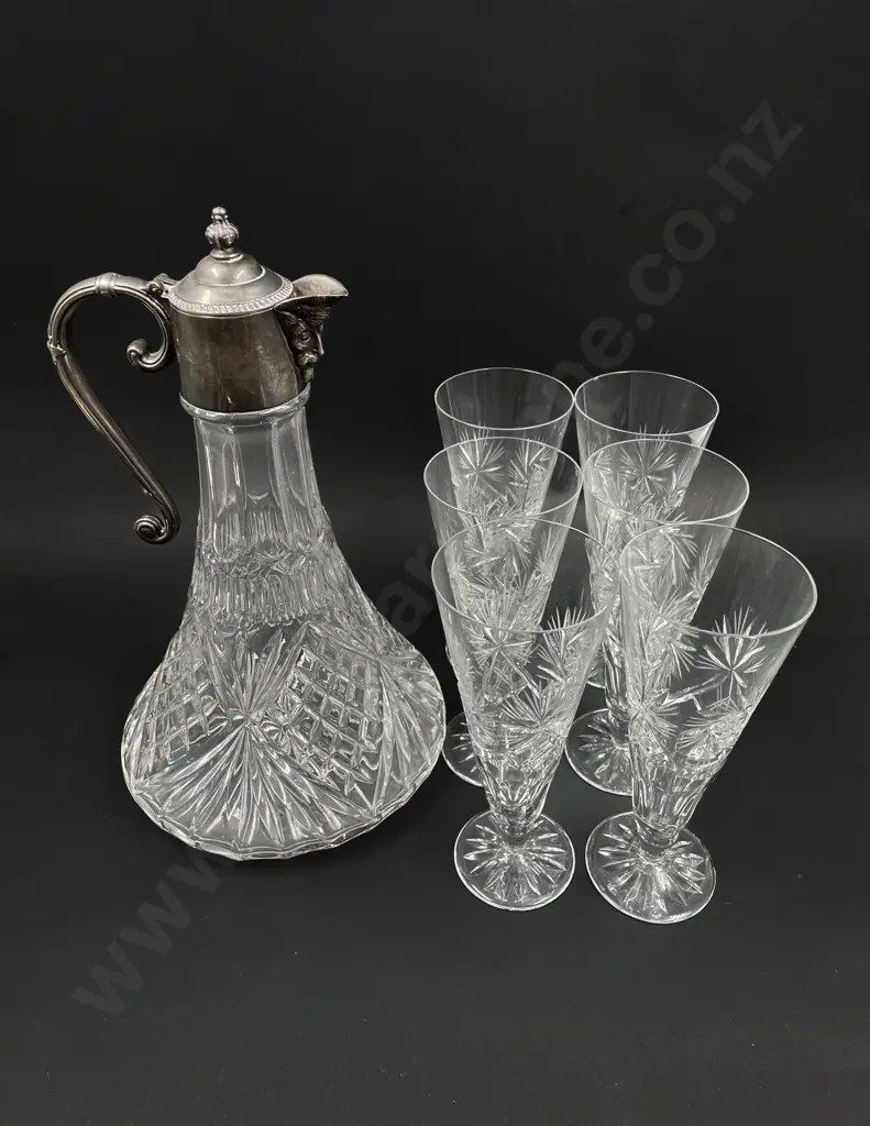 A Claret Jug together with Six Crystal Champagne Glasses Image 1++