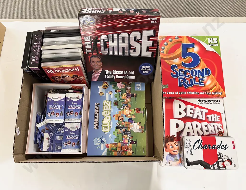 Box of Assorted Games and DVDS Image 1++