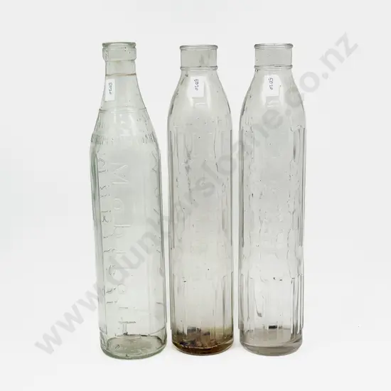 Vintage Glass Mobil Oil Bottle together with Two Shell Oil Bottles
