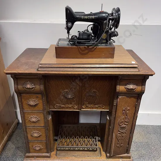Oak Treadle Based Sewing Machine Cabinet with Singer Sewing Machine