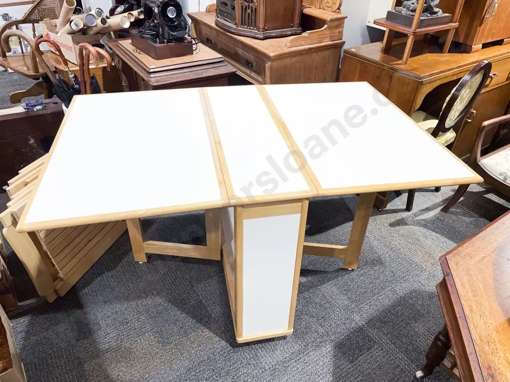 Modern Pembroke Table with Compartment Storing Four Folding Chairs Image 1++