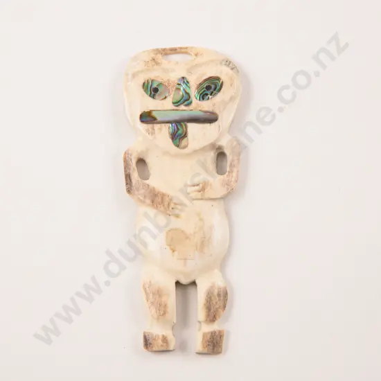 Carved Bone Pendant set with Paua Shell