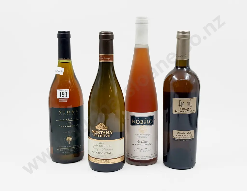 Four Bottles of Assorted Wine Image 1++