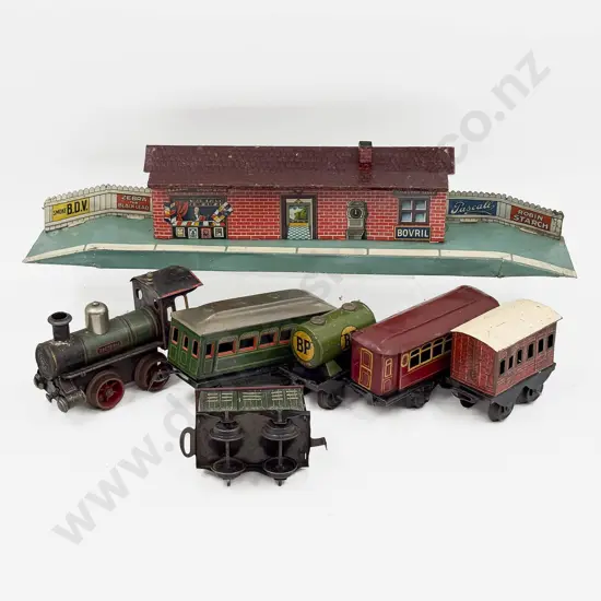 Pre-WWI Bing Clockwork Locomotive with Five Various Tinplate Wagons and Bing Station Platform
