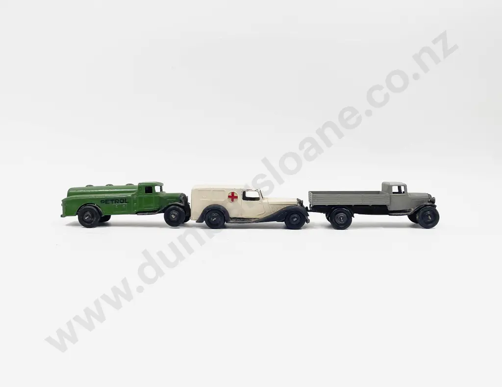 Three First Model Dinky Vehicles Ambulance Petrol Tanker and Flat Bed Truck Image 1++