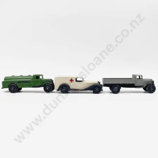 Three First Model Dinky Vehicles Ambulance Petrol Tanker and Flat Bed Truck