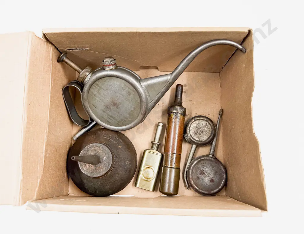 Four Small Oil Cans with Two Grease Guns and Tyre Gauge Image 1++