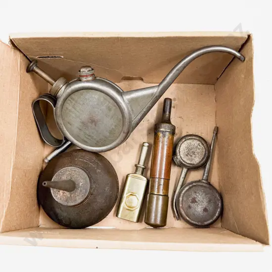 Four Small Oil Cans with Two Grease Guns and Tyre Gauge