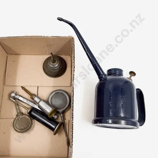 Five Small Oil Cans with Grease Guns and Tyre Gauge