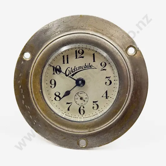 Oldsmobile White Metal Cased Lever Wind Car Clock