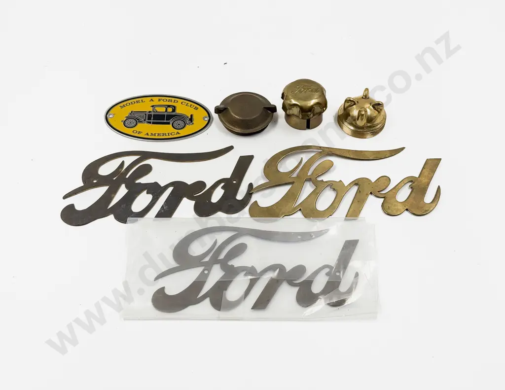 Three Vintage and Replica Brass Ford Emblems and Three Caps and Ford Club Badge Image 1++