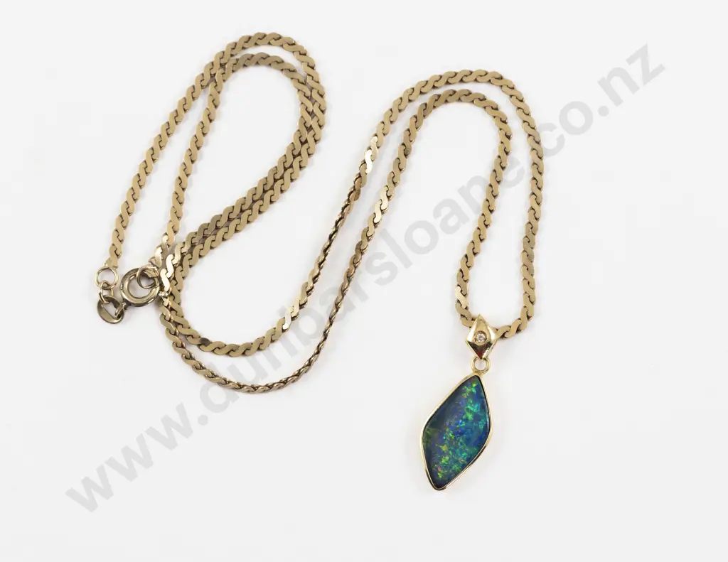 18ct Framed Single Opal and Diamond Pendant Image 1++