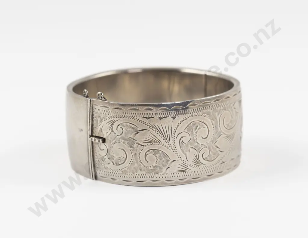 S/S Half Engraved Hinged Snap Bangle Image 1++