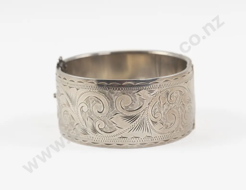 S/S Half Engraved Hinged Snap Bangle Image 1++