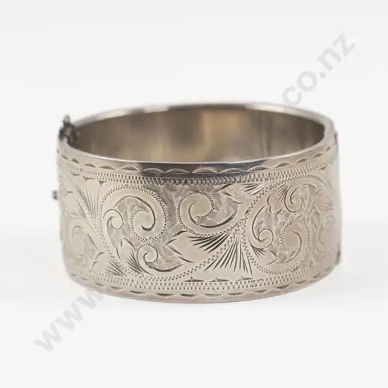 S/S Half Engraved Hinged Snap Bangle
