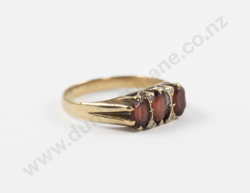 9ct Seven Stone Garnet and Diamond Ring Image 1++