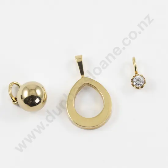 Three 18ct Pendants