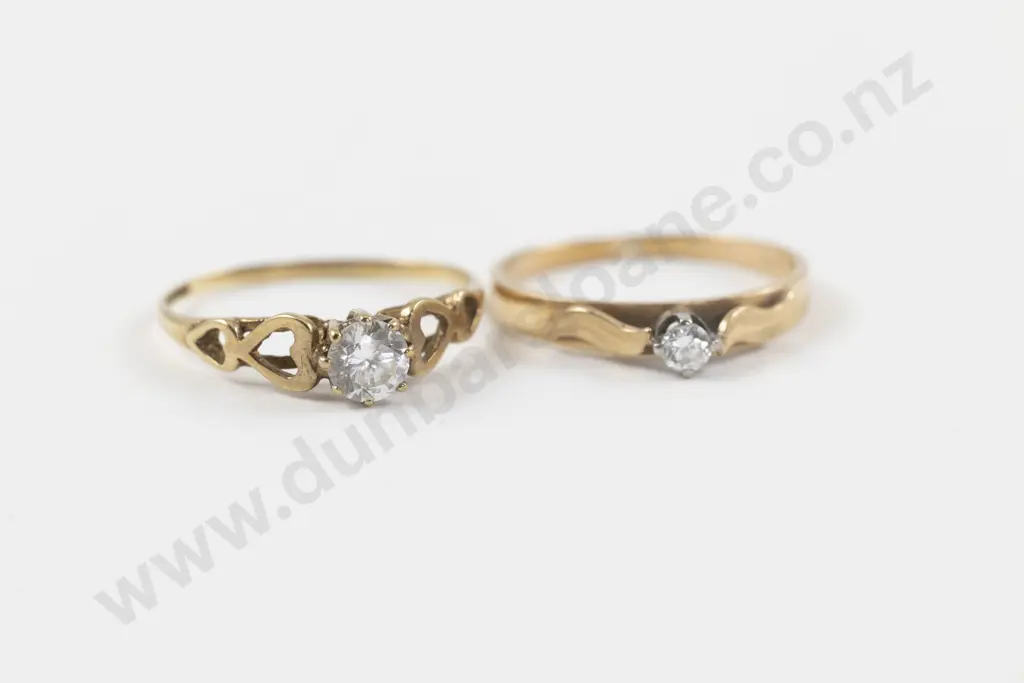 Two 9ct Solitaire Diamond Rings Image 1++
